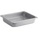 A silver Vigor stainless steel 1/2 size steam table pan with a wire rack.