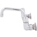 The Equip by T&S wall-mounted faucet with lever handles and a swing spout.
