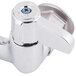 A chrome Equip by T&amp;S wall mount faucet with lever handles.
