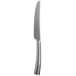 A close-up of a Reserve by Libbey stainless steel dinner knife with a white handle.