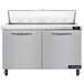 A Continental Refrigerator stainless steel 2 door sandwich prep table.