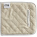 A white terry cloth baker's pad with a pocket.