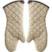 A pair of tan quilted oven mitts with a flame retardant design.