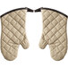 A pair of beige 13" oven mitts with brown leather handles.