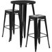 A Flash Furniture black metal bar height table with 2 black square seat backless stools.
