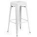 A white metal bar height table with 2 square seat backless stools.