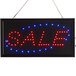A rectangular white LED sale sign with blue lights.