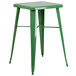 A green metal Flash Furniture bar stool with legs.