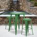 A Flash Furniture green metal bar height table with 2 square stools.