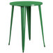A green metal Flash Furniture bar height table with legs.