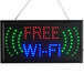 A rectangular white LED sign that says "Free WiFi" with lights on it.