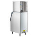 A large white rectangular Scotsman Prodigy Series air cooled ice machine with a door open.