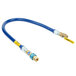 A blue gas connector hose with yellow fittings and a yellow label.