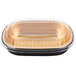 A black and gold aluminum foil pan with a clear plastic dome lid.