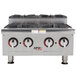 An APW Wyott Step-Up countertop gas range with four burners.