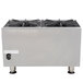 A stainless steel APW Wyott countertop range with four rectangular burners.