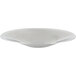 An oval stainless steel bowl with a textured surface.