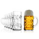 A close-up of a Stolzle Oktoberfest beer mug filled with beer.