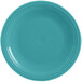 A close-up of a turquoise Fiesta® chop plate with a rim.