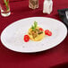 Arcoroc P3967 Opal Restaurant White 11 3/4" Oval Platter by Arc Cardinal   - 12/Case Main Thumbnail 1