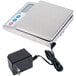 A silver Cardinal Detecto PS4 electronic portion scale on a counter with a screen.