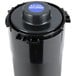 A black cylinder with a blue lid and white gasket.