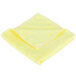 A yellow Unger SmartColor Microfiber cloth folded on a white background.