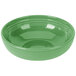 A green Fiesta china bowl with a circular pattern.