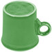 A close-up of a green Fiesta china mug with a handle.