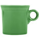 A close-up of a Fiesta Meadow green china mug with a handle.