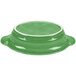 A green oval casserole dish with a white rim.