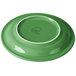 A green Fiesta® china appetizer plate with a white rim.