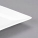 CAC DM-C12 White Diamond 10 1/2" x 6 1/2" Bright White Porcelain Coupe Dinner Plate - 12/Case Main Thumbnail 5