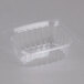 A Dart clear rectangular plastic container with a lid.