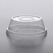 A clear Dome PET lid on a clear plastic container with a round bottom.