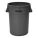 A gray plastic Continental Huskee trash can.