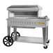 A stainless steel Crown Verity mobile outdoor pizza oven with wheels.