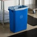 A blue Lavex slim rectangular recycle bin with a recycle symbol on it.