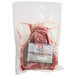 A package of Warrington Farm Meats Frozen Porterhouse Steaks on a white surface.