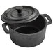 A black Vollrath pre-seasoned cast iron pot with a lid.