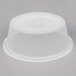 A clear oval Pactiv plastic souffle container with a lid.