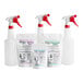 A set of white Noble Chemical QuikPacks bottles with red and white sprayers.