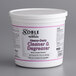 A white tub of Noble Chemical Heavy Duty Cleaner and Degreaser QuikPacks with purple text.