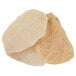 A close-up of a piece of Brakebush Farm Pantry boneless skinless chicken breast.
