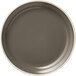 A close up of a Libbey Englewood matte olive porcelain plate with a rim.