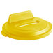 A yellow Rubbermaid lid with a paper slot for a recycling bin.