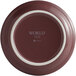 A close up of a Libbey Matte Mulberry porcelain plate with a logo.