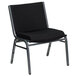 A Flash Furniture Hercules black fabric stack chair with a black metal frame.