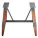 A Lancaster Table & Seating wooden trestle table base with metal legs.