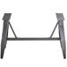 A metal Lancaster Table & Seating trestle table base with two legs.